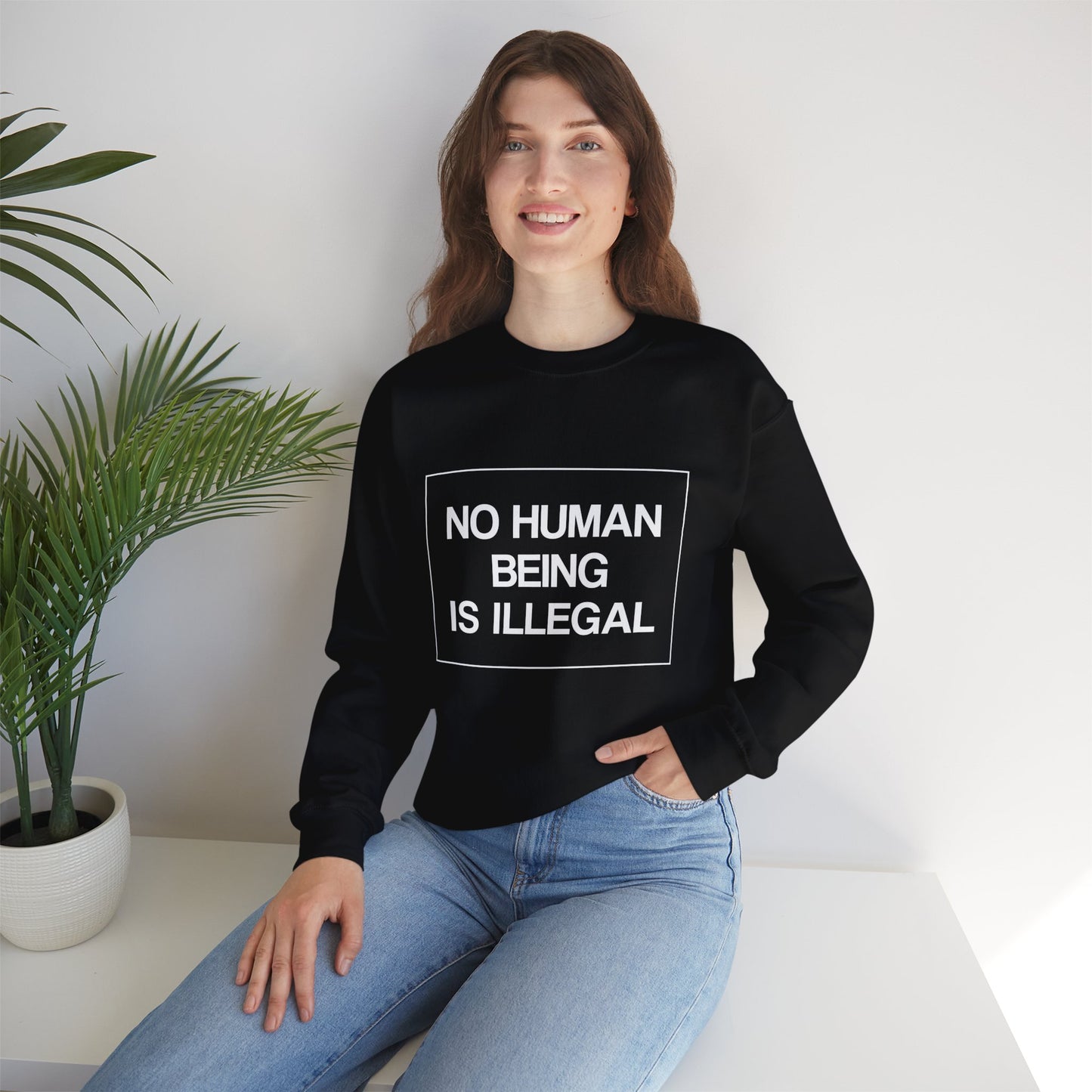 “No Human Being is Illegal” Unisex Sweatshirt