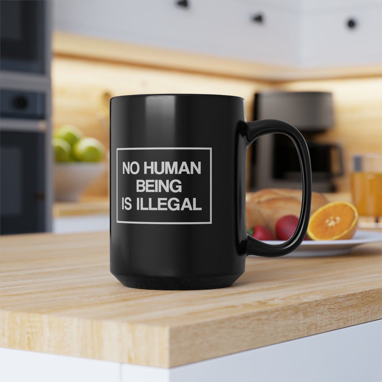 “No Human Being is Illegal” 15 oz. Mug