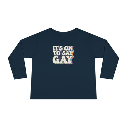 “It’s OK to Say Gay” Toddler Long Sleeve Tee